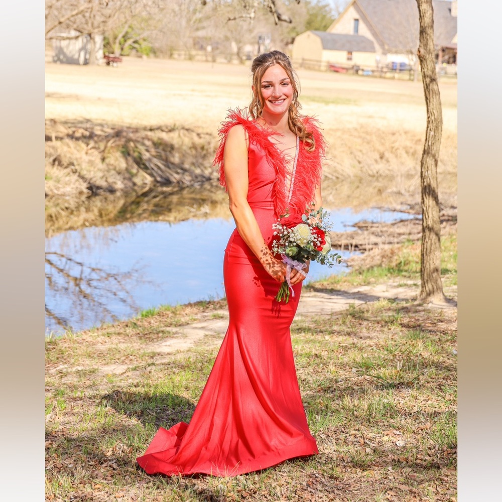Jessica Angel red formal prom or Homecoming dress.